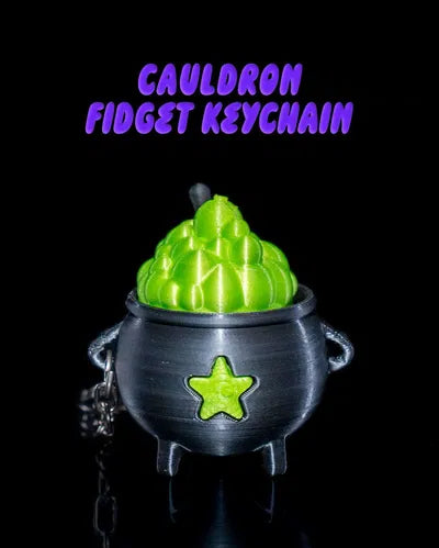 Halloween cauldron keychain with bubbling green fidget topper