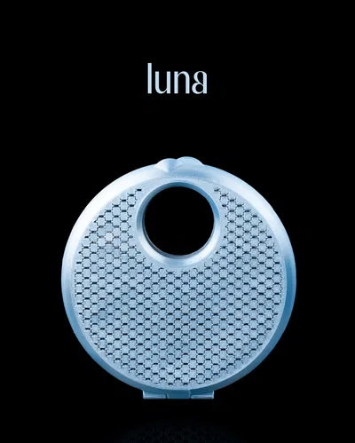 Light blue circular 3D printed purse with a central cut-out resembling a full moon, featuring a modern mesh pattern and chain strap.