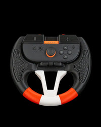 Front view of a black, white, and orange steering wheel grip holding a controller