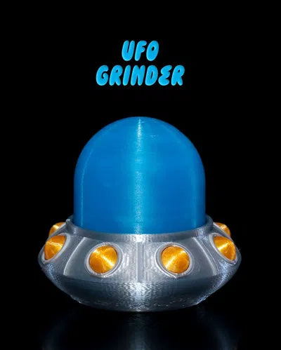 Blue and silver UFO grinder toy with gold alien lights