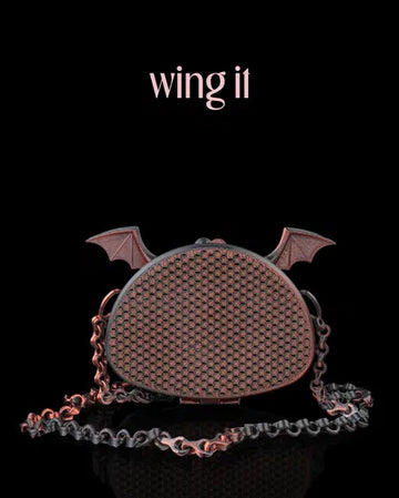 Black 3D printed purse with red undertones and sculpted bat wings, designed with a mesh texture and a gothic aesthetic.