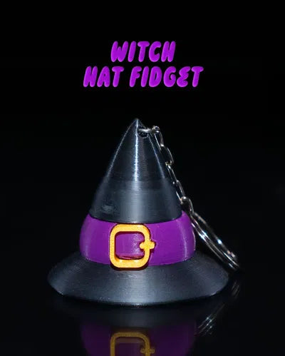Witch hat-shaped fidget keychain with purple band and yellow buckle