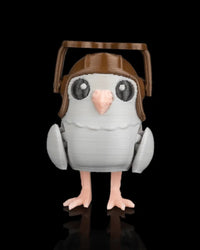 Small gray pigeon figurine standing forward with brown aviator helmet and goggles