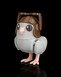 Small gray pigeon figurine shown from an angled front view with brown helmet