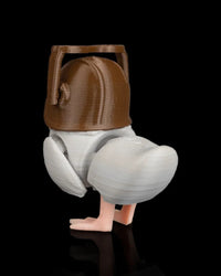 Rear view of a small gray pigeon figurine with brown helmet, gray wings, tail, and pink feet