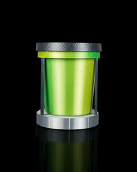 Green inner plant pot seated inside a gray frame with dark vertical supports