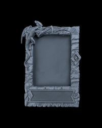 Gray dragon-themed photo frame with an empty center opening on a black background