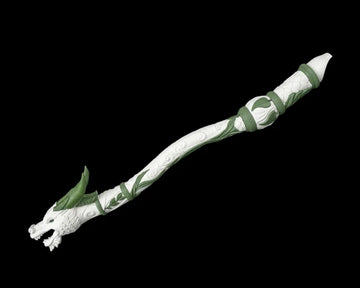 White and green dragon-shaped flute figurine on a black background