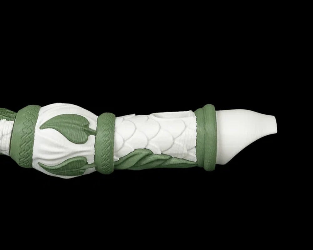 Close-up of the white and green end section with bands and scale details