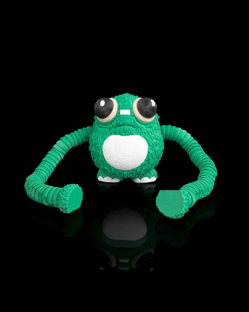 Front view of a green frog fidget with long segmented arms spread wide on a black background