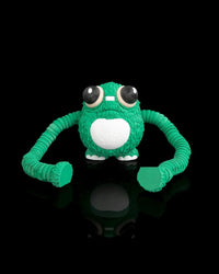 Front view of a green frog fidget with long segmented arms spread wide on a black background