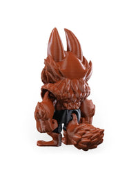Rear angled view of a reddish-brown monster figurine showing tall ears, textured back, dark lower-body detail, and tail.