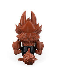 Back view of a reddish-brown monster figurine with tall ears, spiky side details, large hands, and textured tail.