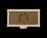 Top view of a tan garden bed frame with a brown insert and flower-shaped opening.