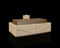 Angled view of a tan garden bed tray with a brown insert and small sign on a black background.