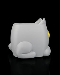 Rear angled view of a gray cat-shaped planter with a curled tail and side paw