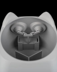 Top-down view inside a gray cat-shaped planter showing interior compartments