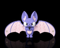 Purple bat figurine with pink wings spread wide on a black background