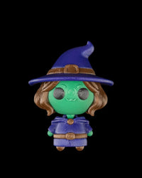 Small witch character with a blue hat, green face, blue robe, and brown hair on a black background