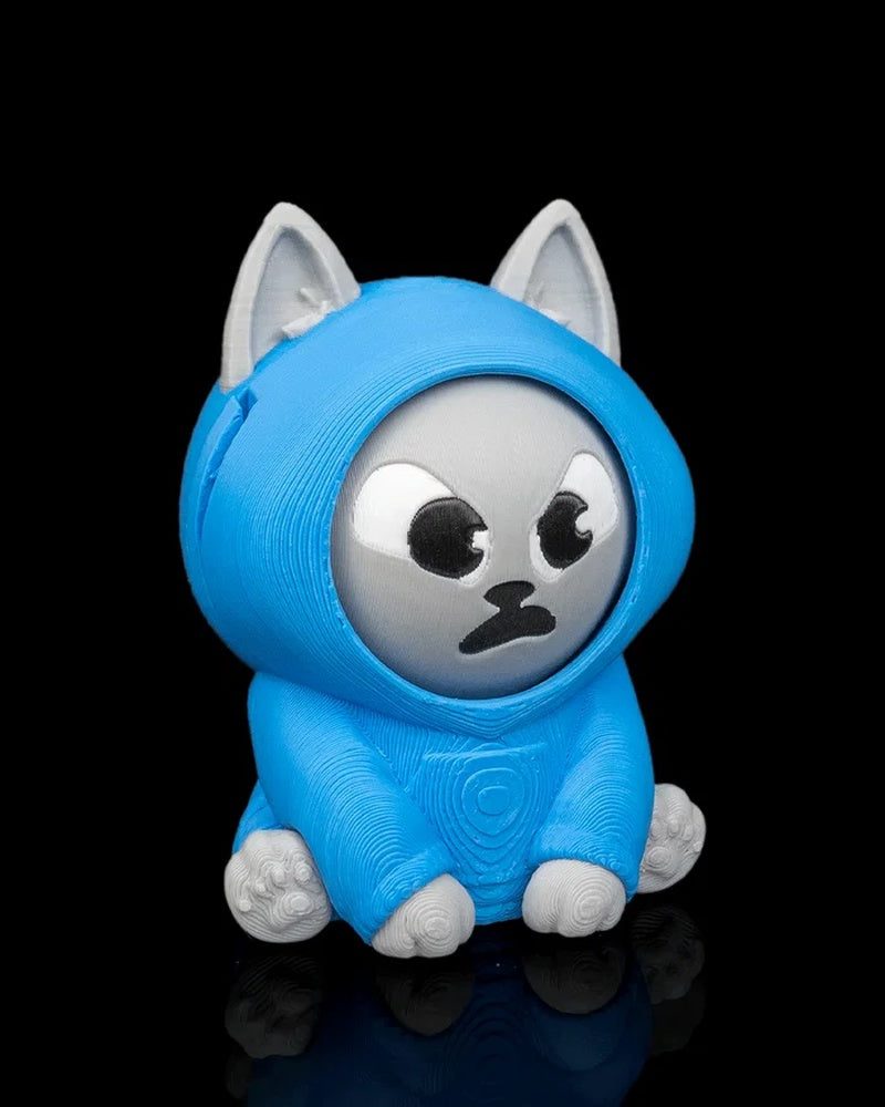 Angled front view of a blue hooded gray cat toy with an angry facial expression on a black background