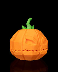Angled front view of an orange jack-o'-lantern pumpkin object with a green stem on a black background