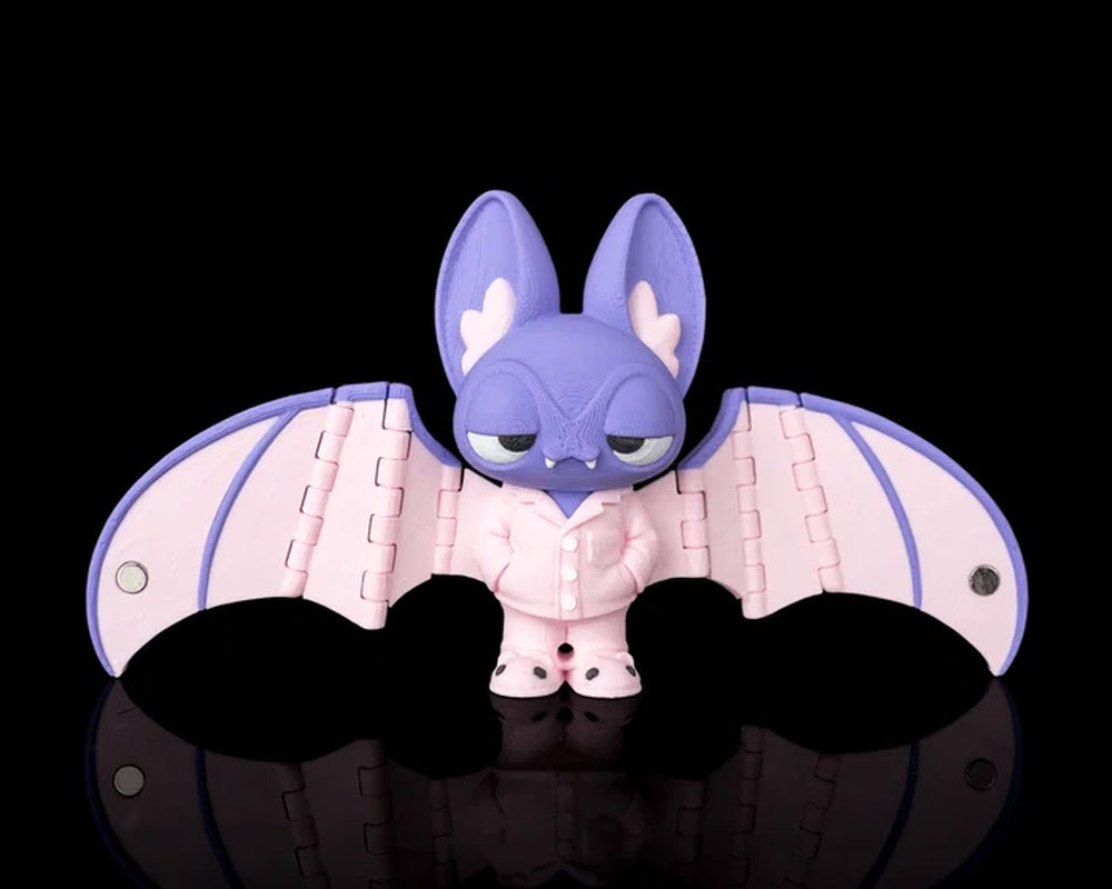 Purple and pink bat figure with wide wings on a black background