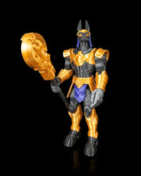 Front view of a jackal-headed armored figurine holding a staff with a round gold head.