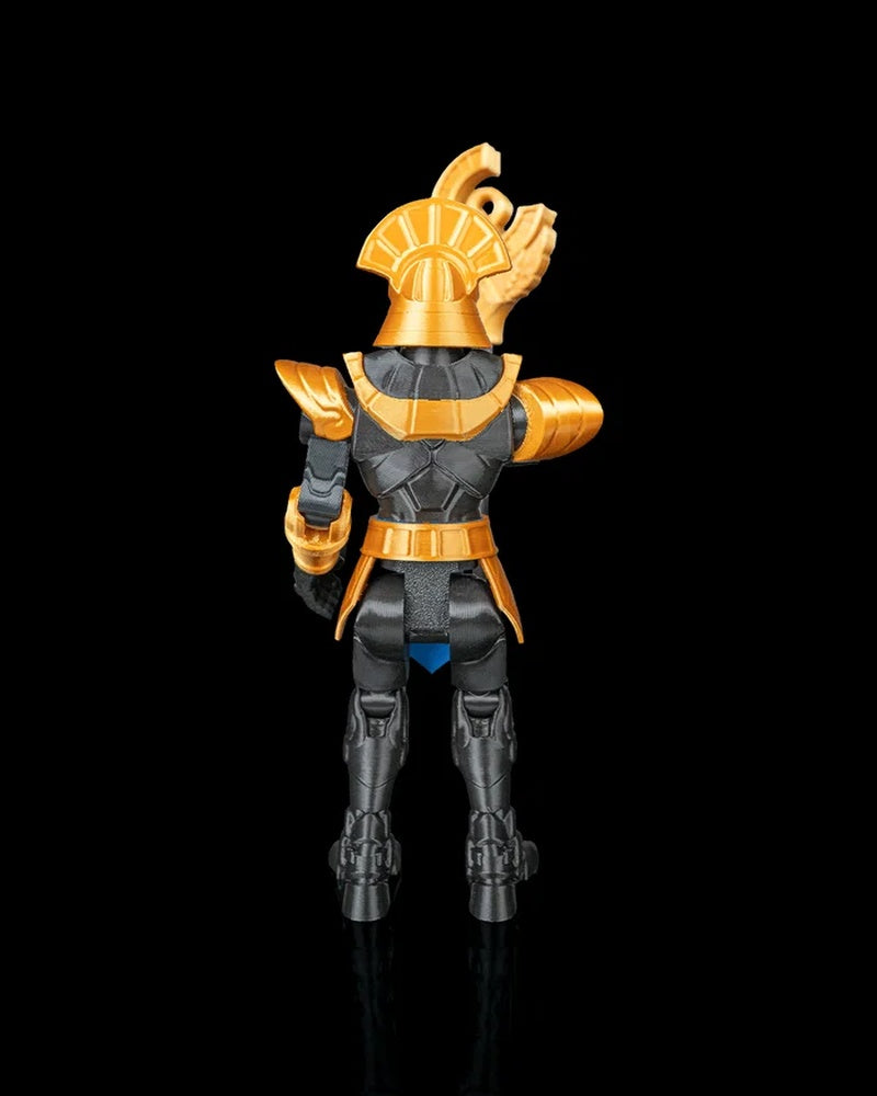 Rear view of a black and gold armored figurine with a staff visible behind one shoulder on a black background.