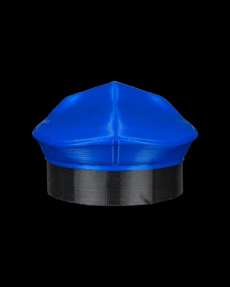 Back view of a blue cap with a black band on a black background