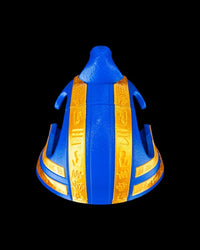 Rear view of a blue and gold pharaoh-style headpiece on a black background