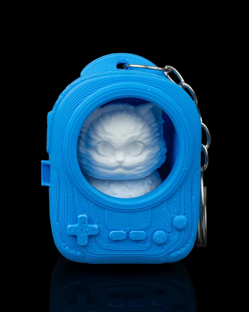 Blue backpack-shaped case with a white cat face visible through a round opening