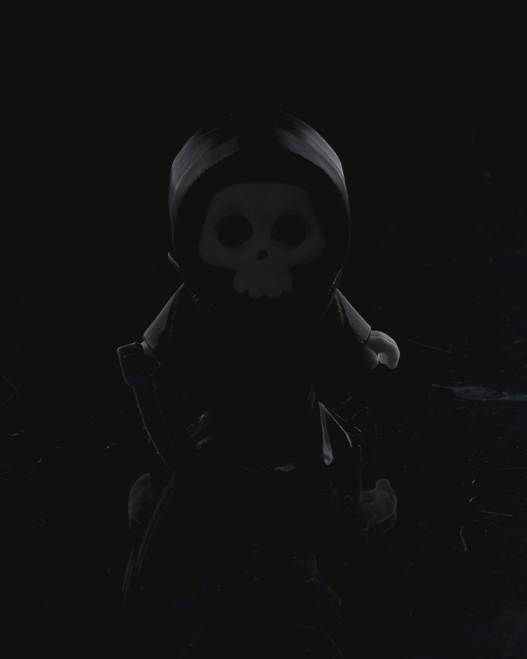 Blade-Bearing Hooded Skull Monster Figurine