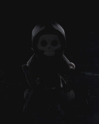 Blade-Bearing Hooded Skull Monster Figurine