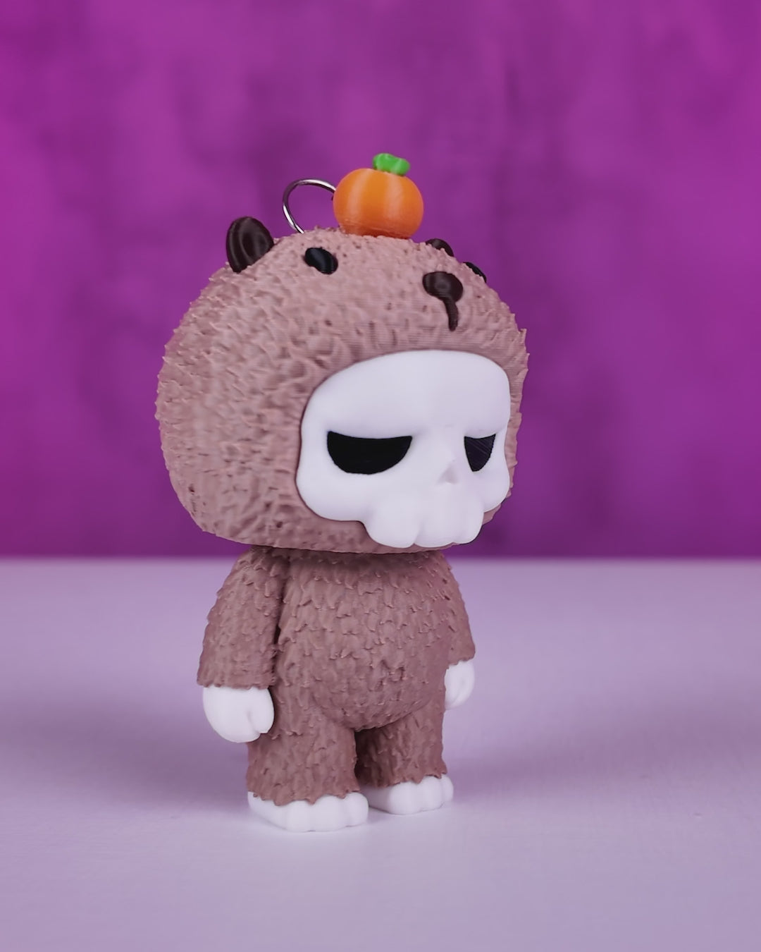 Tiny Tangerine Grump Skull Bear Figurine