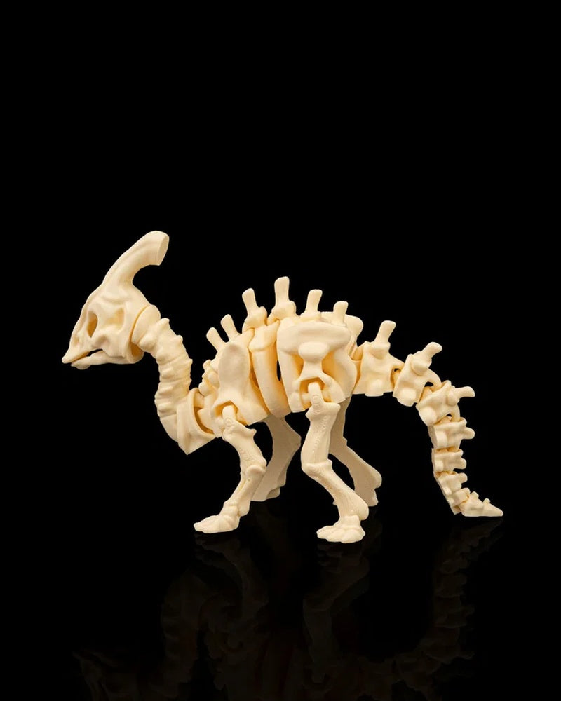 Cream-colored skeleton dinosaur figurine in side profile with a curved head crest and long tail