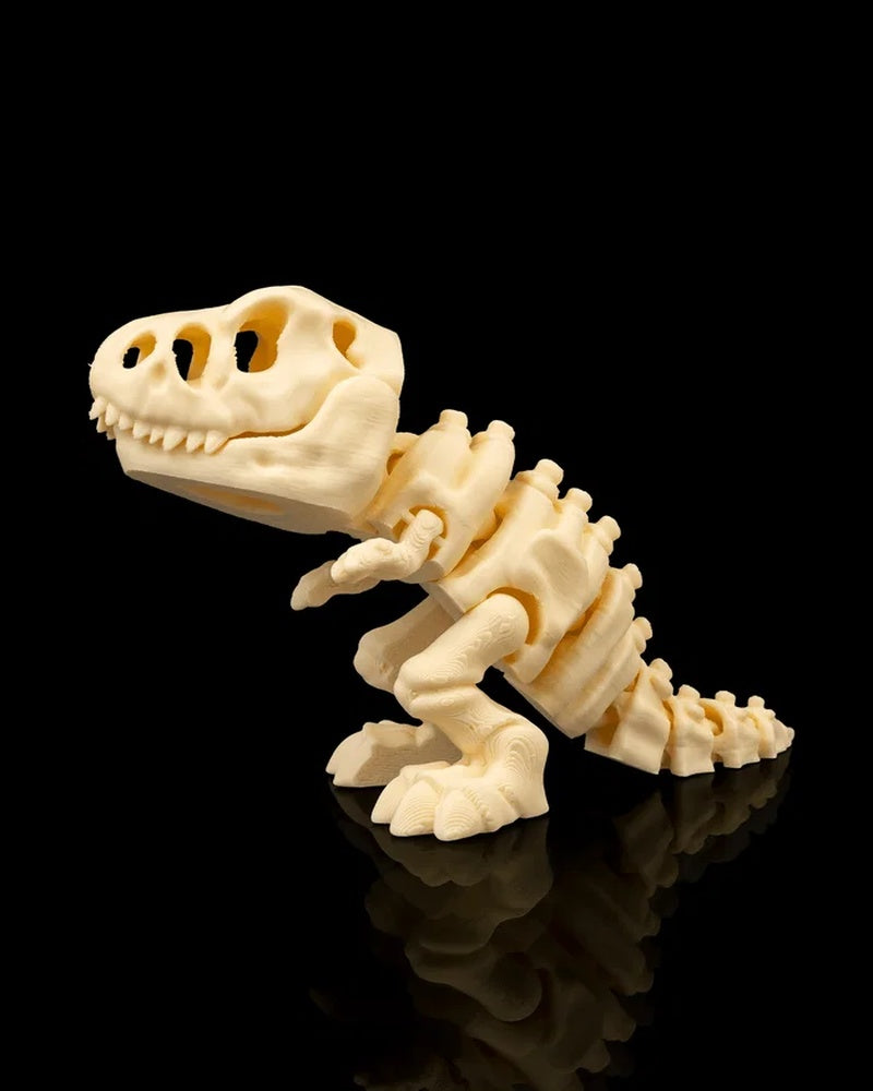 Cream T-Rex skeleton figurine angled forward with skull, ribs, legs, and tail visible