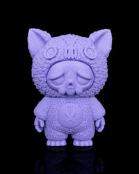 Single-color purple bat-themed skull figurine with button details on a black background