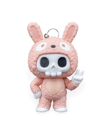 Front view of a pink bunny-suit skull character with tall ears and a raised peace-sign hand