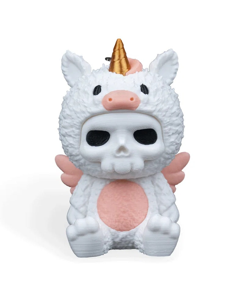 Front view of a white unicorn costume figurine with a gold horn, pink belly, pink wings, and skull-like face