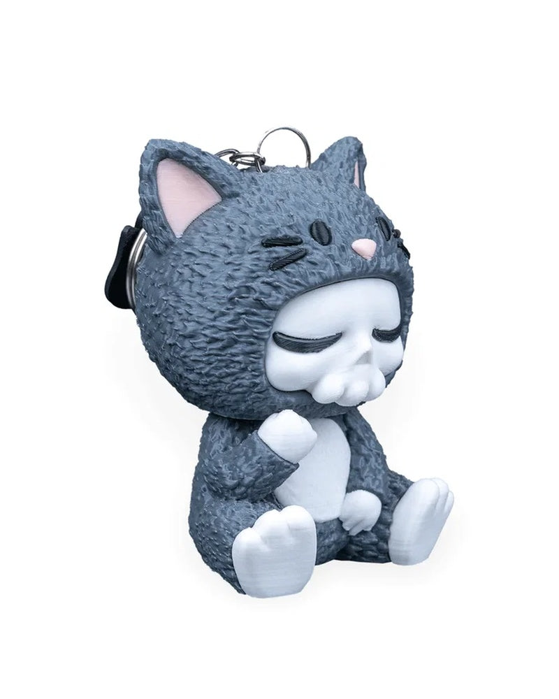 Angled view of a seated gray cat costume character with a metal ring visible above the head