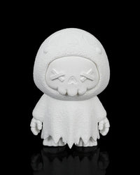 Front view of an all-white ghost skull figurine with raised facial details and a ragged robe on a black background.