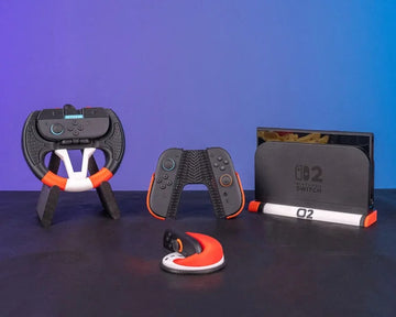 Gaming controllers and black, white, and orange grip accessories arranged on a tabletop