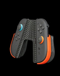 Angled front view of a black controller grip with orange side accents