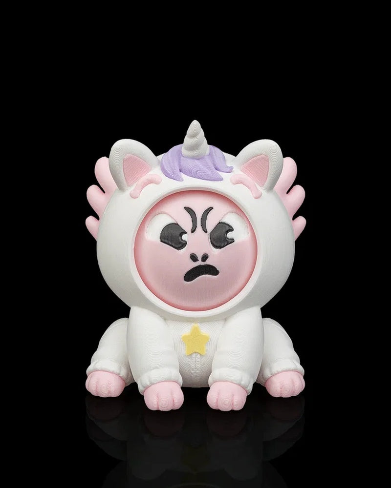Front view of a white unicorn axolotl character with an angry pink face, purple mane, horn, pink frills, and yellow star accent on a black background