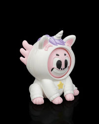 Angled front view of a white unicorn axolotl character with a smiling pink face, horn, purple mane, pink frills, and yellow star accent