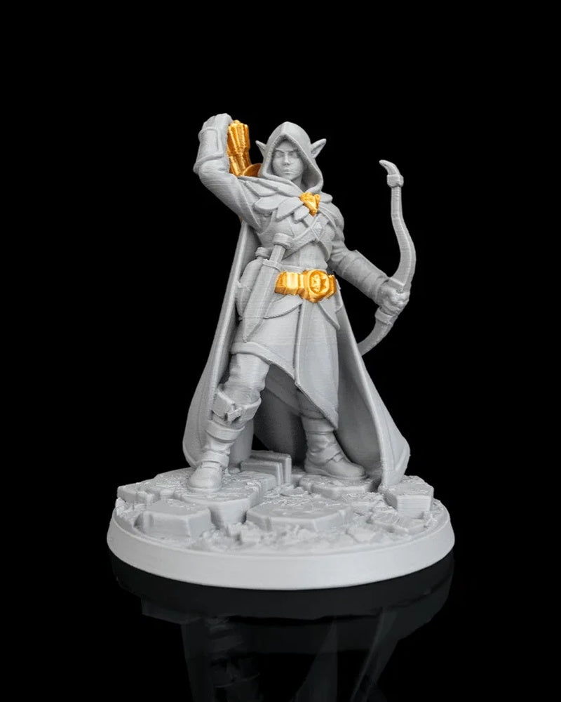 Hooded archer figurine with bow, cloak, gold-colored accents, and round base on a black background